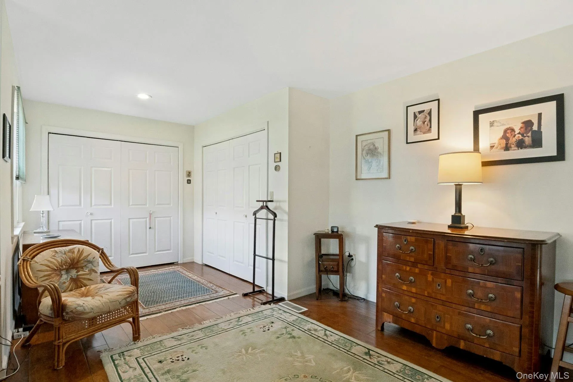 Spacious primary bedroom with sitting area and 2 closets. Spacious primary bedroom with sitting area and 2 closets.
