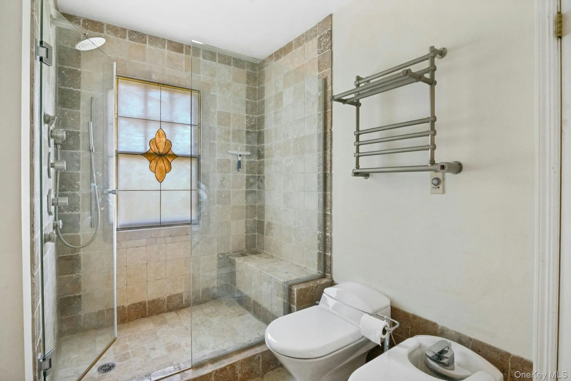 Primary bathroom walk in shower. Primary bathroom walk in shower.
