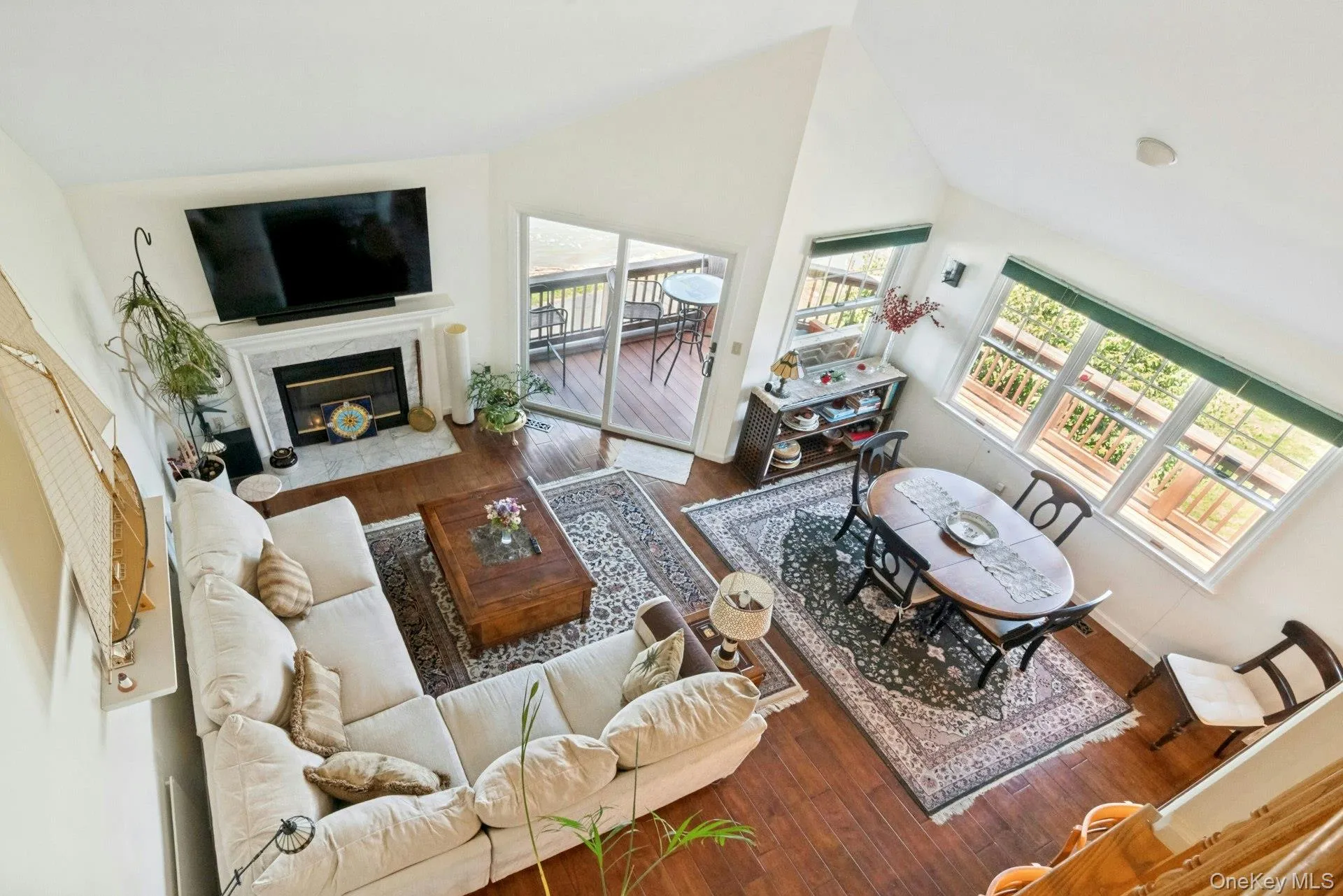View from upstairs overlooking the living room. View from upstairs overlooking the living room.