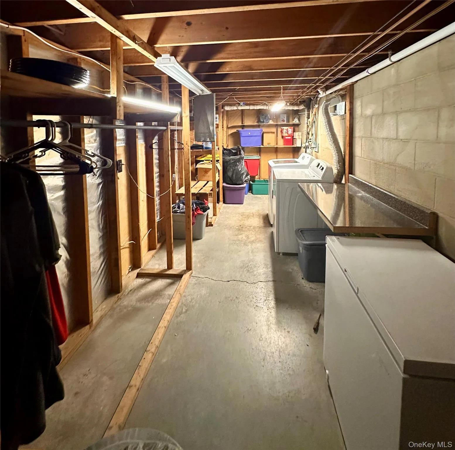 Ample size laundry room with storage space Ample size laundry room with storage space