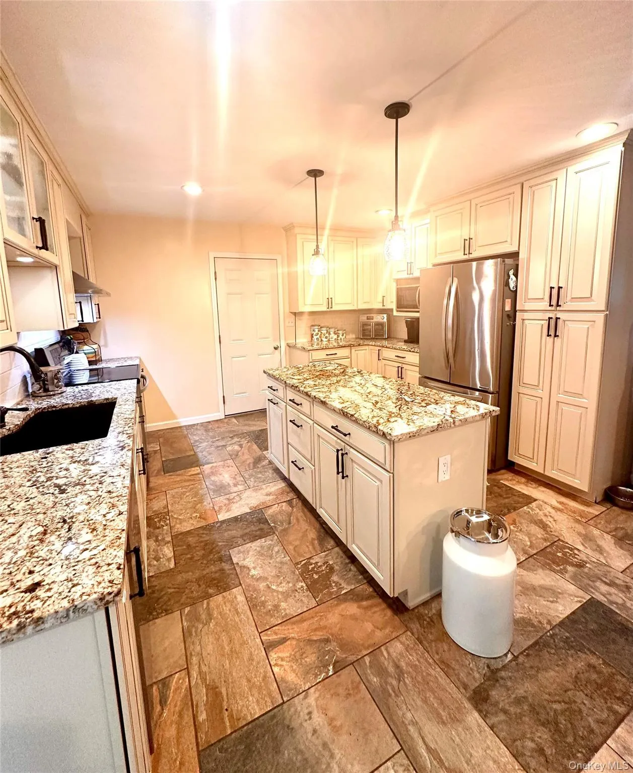 Updated kitchen has plenty of workspace, granite countertops & stainless steel appliances Updated kitchen has plenty of workspace, granite countertops & stainless steel appliances