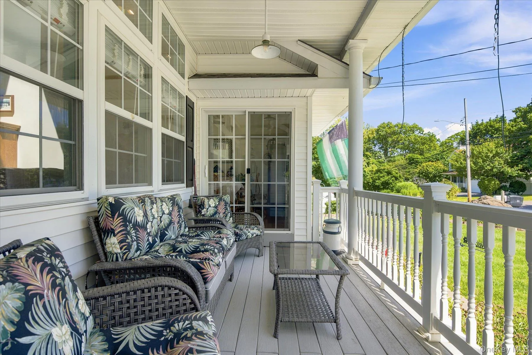 Cozy rocking chair porch with entry to great room or formal dining room Cozy rocking chair porch with entry to great room or formal dining room