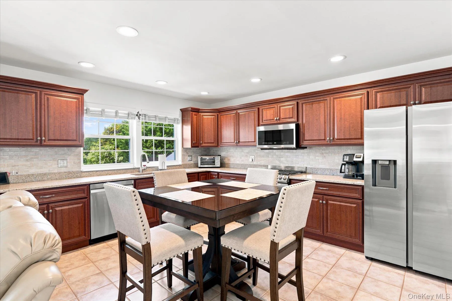 Large granite Eat In Kitchen with newer SS Appliances, cherry cabintry and open floor plan Large granite Eat In Kitchen with newer SS Appliances, cherry cabintry and open floor plan
