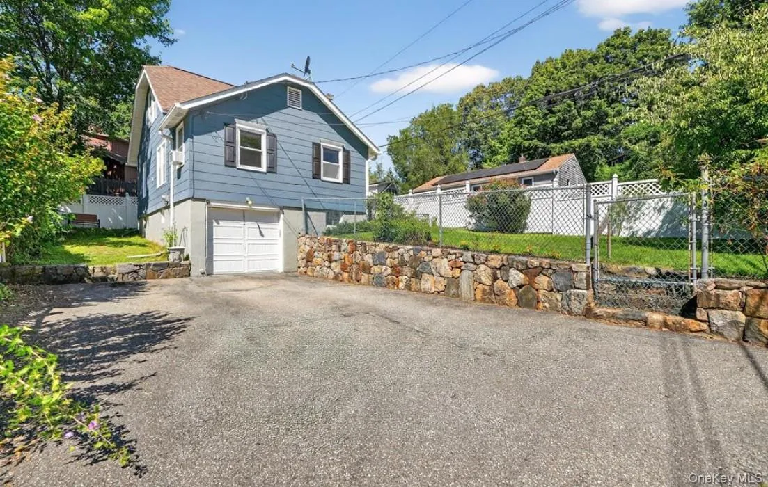 Driveway parking for four cars, plus garage plus on street parking ready for all your guests at your housewarming party Driveway parking for four cars, plus garage plus on street parking ready for all your guests at your housewarming party