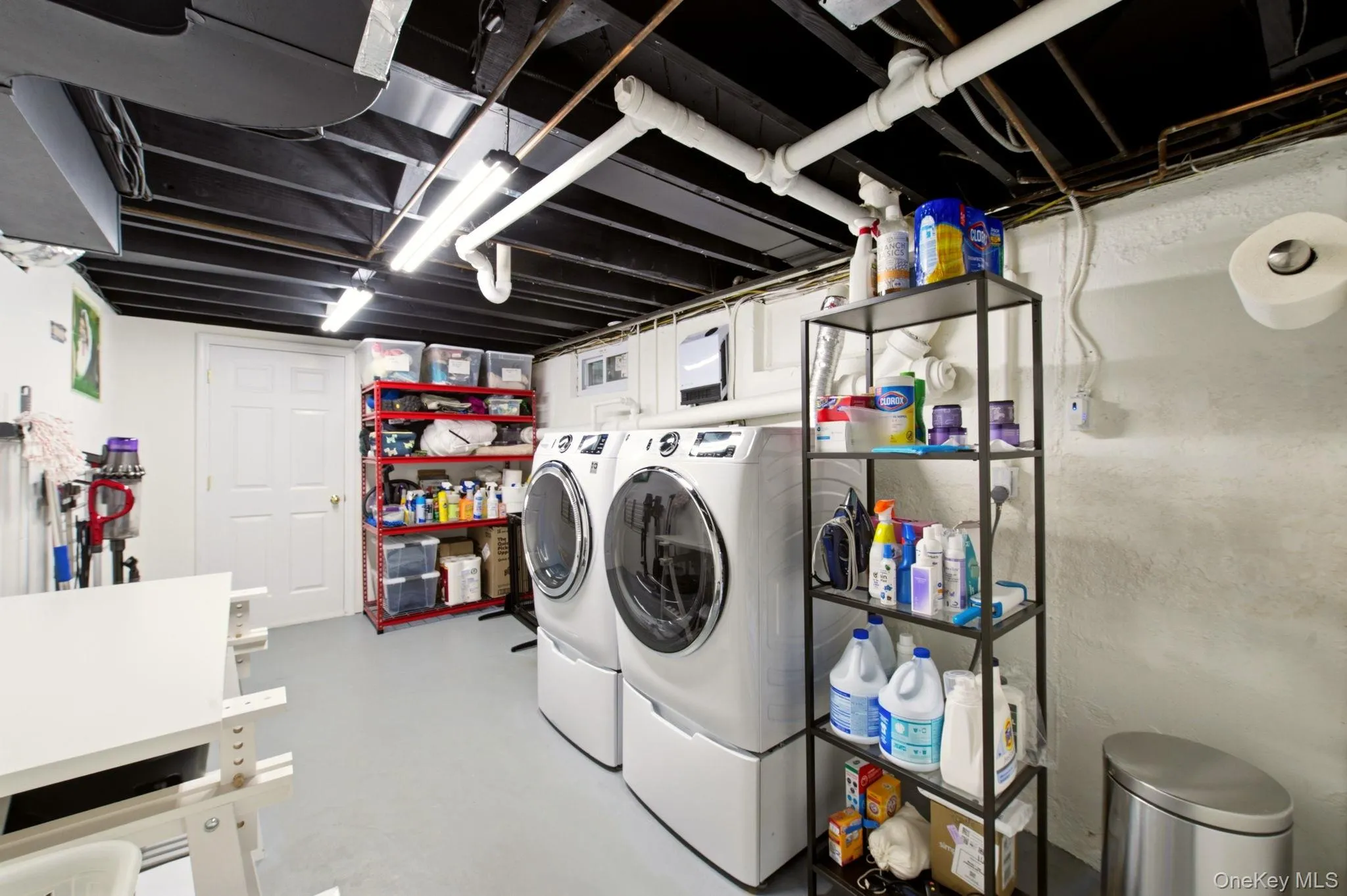 Spacious Laundry Room with Laundry Shoot & Storage Spacious Laundry Room with Laundry Shoot & Storage