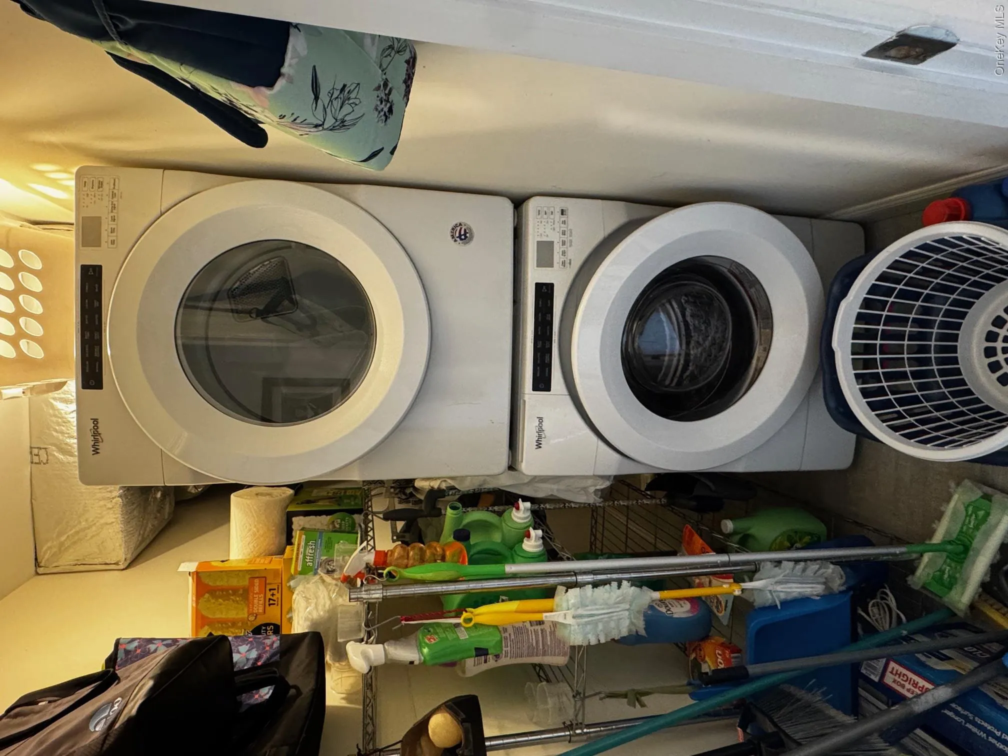 Washroom with estacked washer and dryer Washroom with estacked washer and dryer