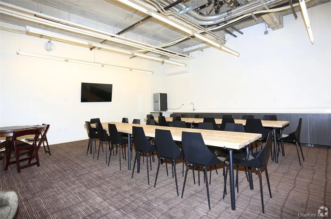 Community room which is perfect for remote work, learning or to have friends over to enjoy the game Community room which is perfect for remote work, learning or to have friends over to enjoy the game