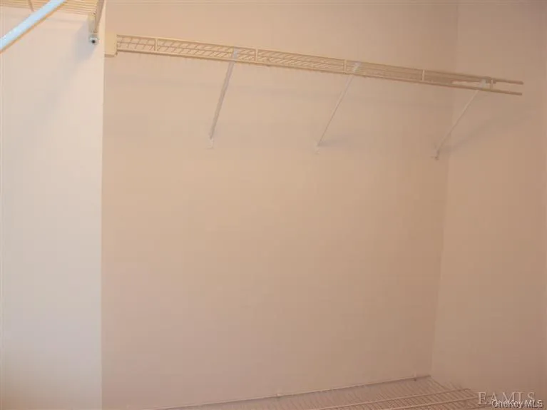 Large Walk in Closet in Primary Bedroom Large Walk in Closet in Primary Bedroom