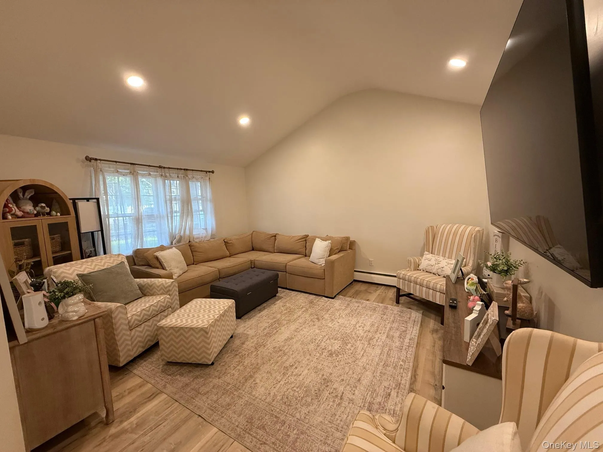 Living room with Vaulted Ceiling Living room with Vaulted Ceiling