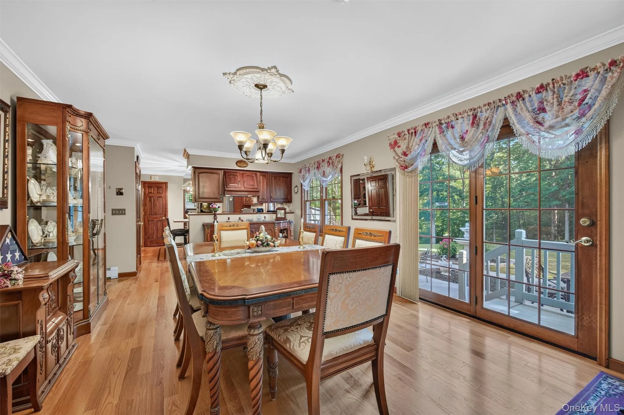 Formal dining room with sliding glass doors to spacious backyard. Formal dining room with sliding glass doors to spacious backyard.