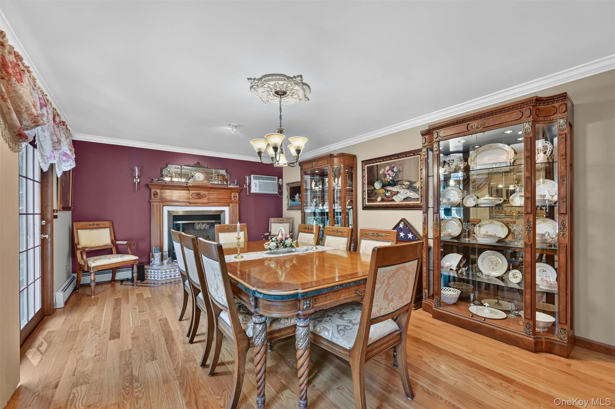 Very large formal dining room showing fireplace. Very large formal dining room showing fireplace.