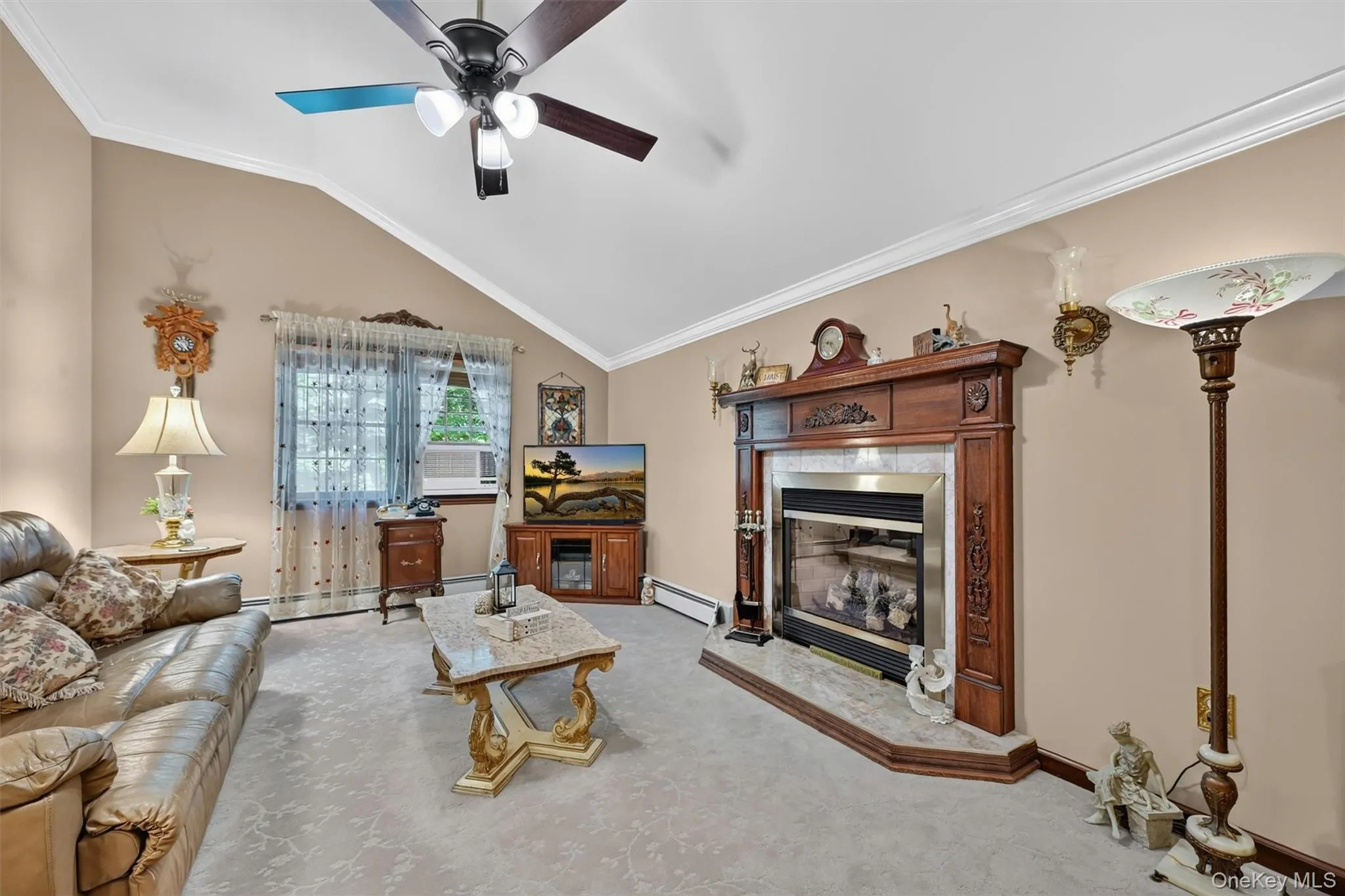 Family room showing lovely fireplace. Family room showing lovely fireplace.