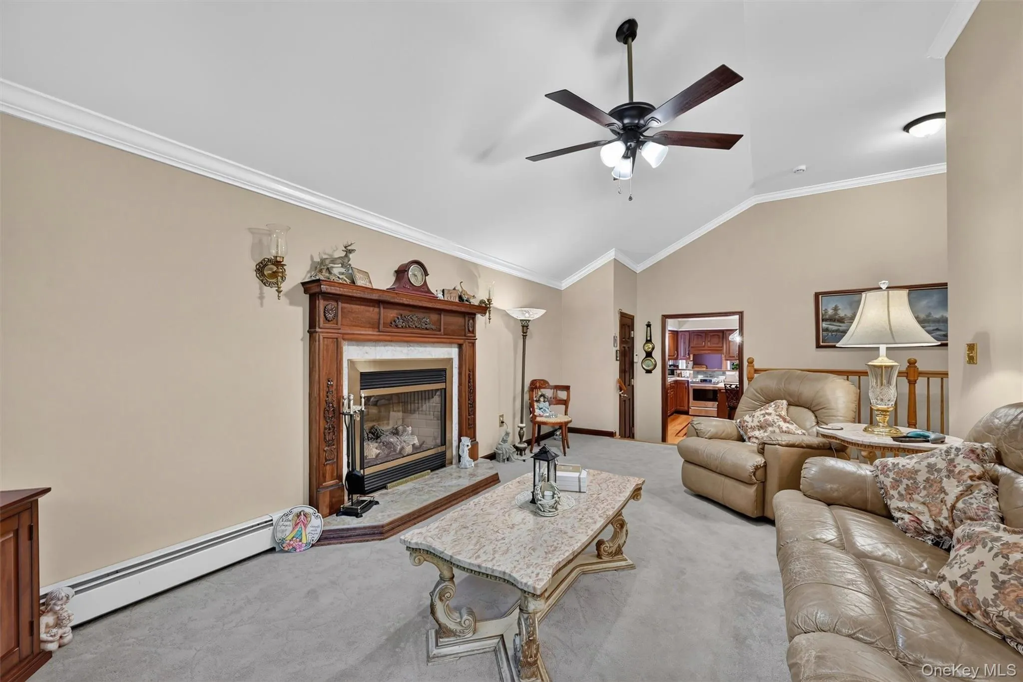 Family room showing entrance to kitchen and stairs down to two car garage, Family room showing entrance to kitchen and stairs down to two car garage,