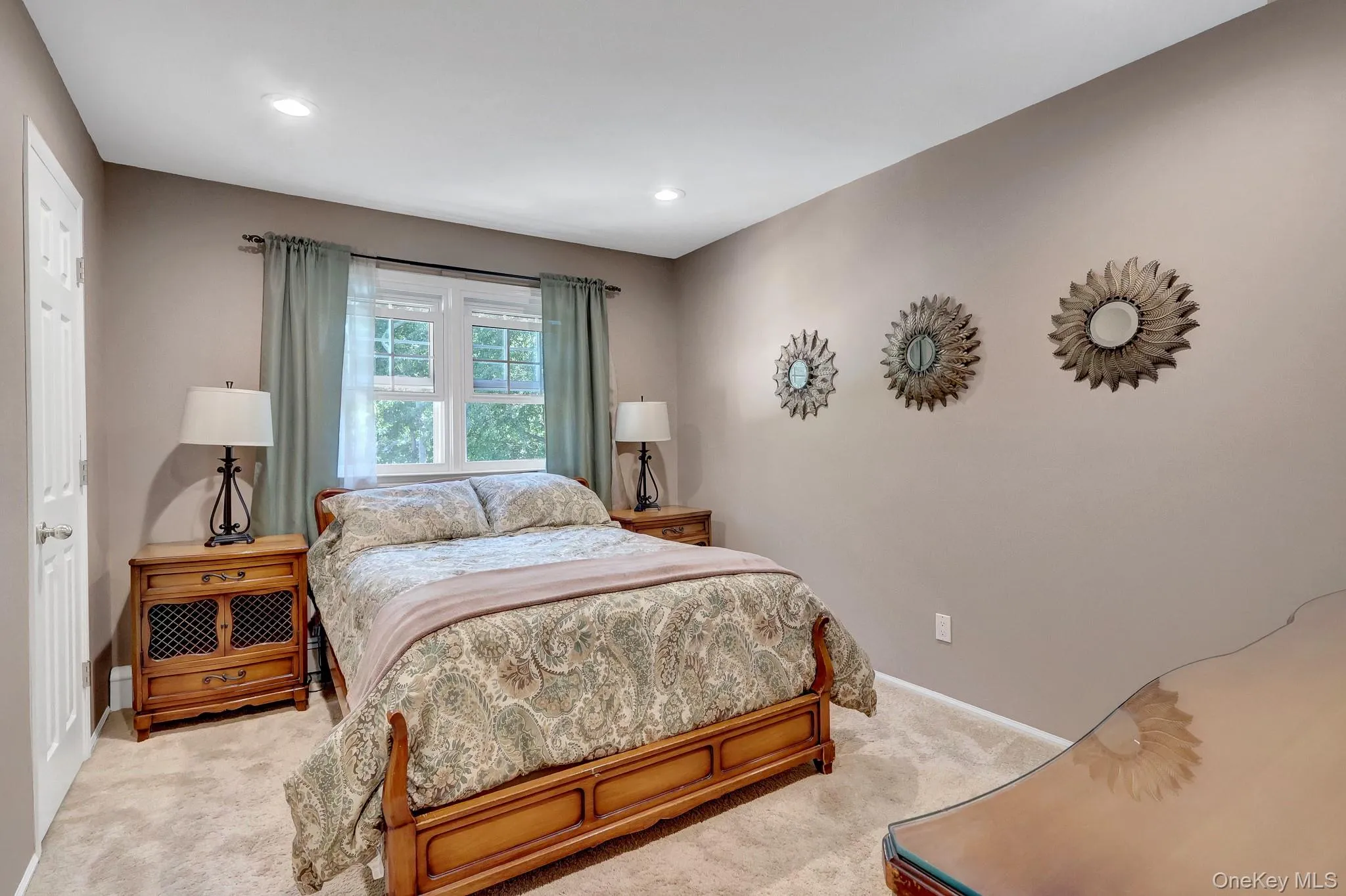 Carpeted room featuring neutral wall tones and recessed lighting Carpeted room featuring neutral wall tones and recessed lighting