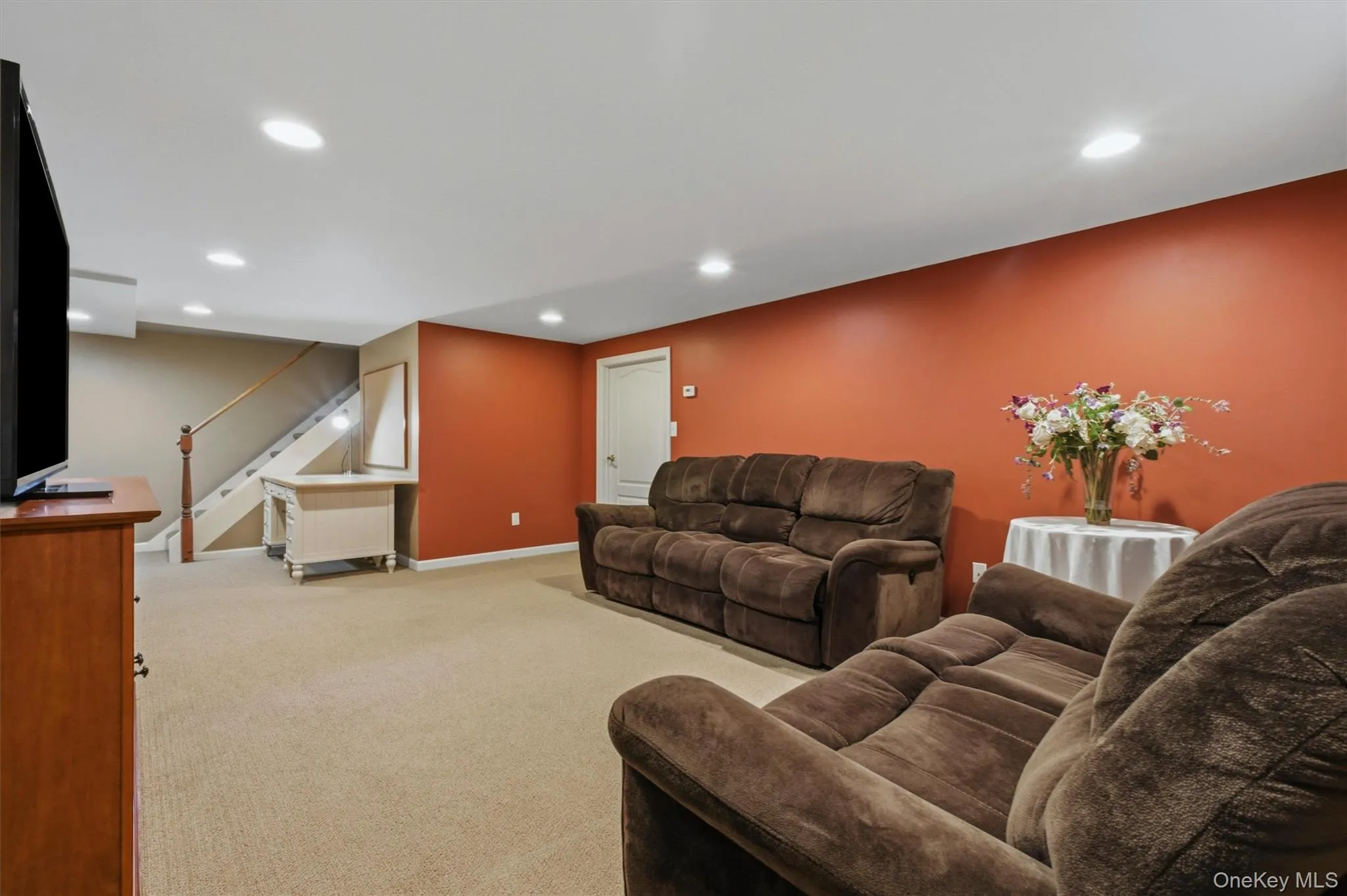 Great, finished lower-level space for recreation, TV, hobbies, gym, home office Great, finished lower-level space for recreation, TV, hobbies, gym, home office