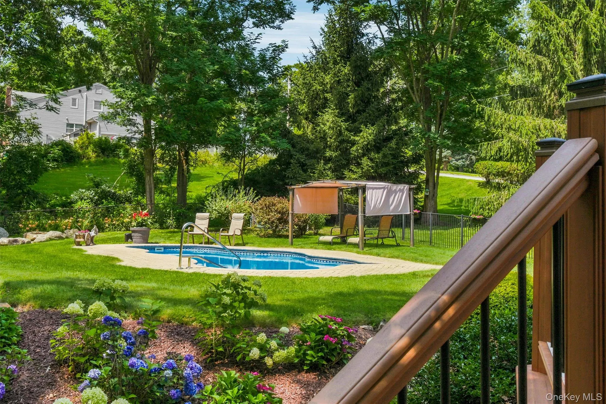 Lovely landscaping and flowers surround (magnolias, hydrangeas, lilies, lavender & sunset views are promised) Lovely landscaping and flowers surround (magnolias, hydrangeas, lilies, lavender & sunset views are promised)