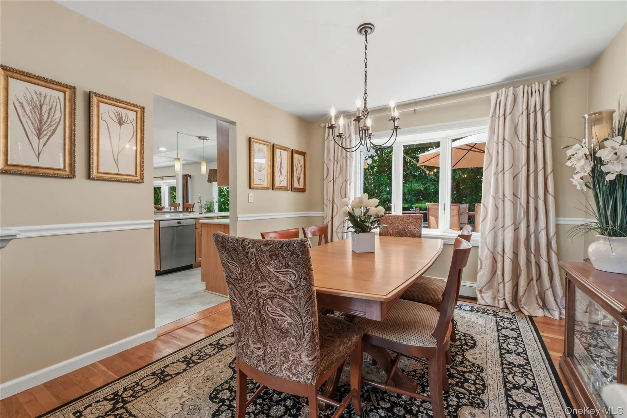 Formal Dining room w/Andersen Bay window facing rear of home and expansive outside deck Formal Dining room w/Andersen Bay window facing rear of home and expansive outside deck