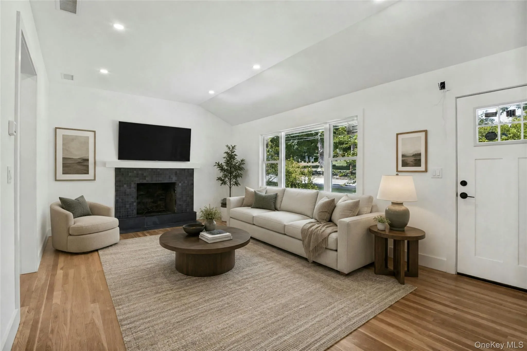 Living Room with fireplace, high ceilings. Virtually Staged Living Room with fireplace, high ceilings. Virtually Staged