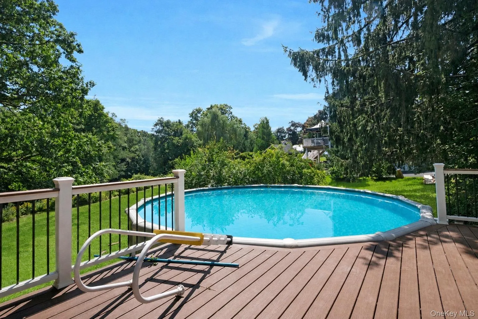 Above ground pool with composite decking Above ground pool with composite decking