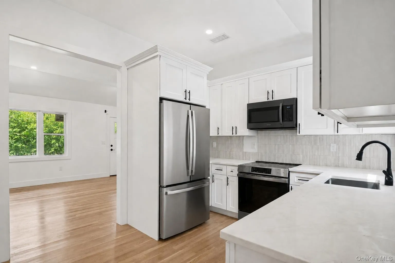 All New Kitchen with with White soft close cabinetry and Quartz counters All New Kitchen with with White soft close cabinetry and Quartz counters