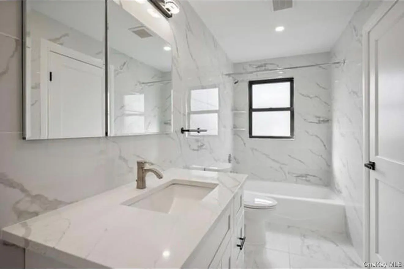 Fully renovated bathroom with linen closet. Fully renovated bathroom with linen closet.