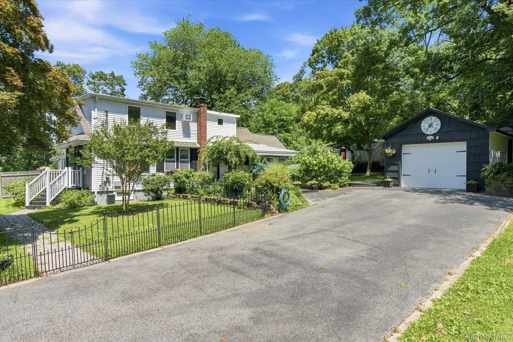 Plenty of parking plus a detached 1.5 car garage. Plenty of parking plus a detached 1.5 car garage.