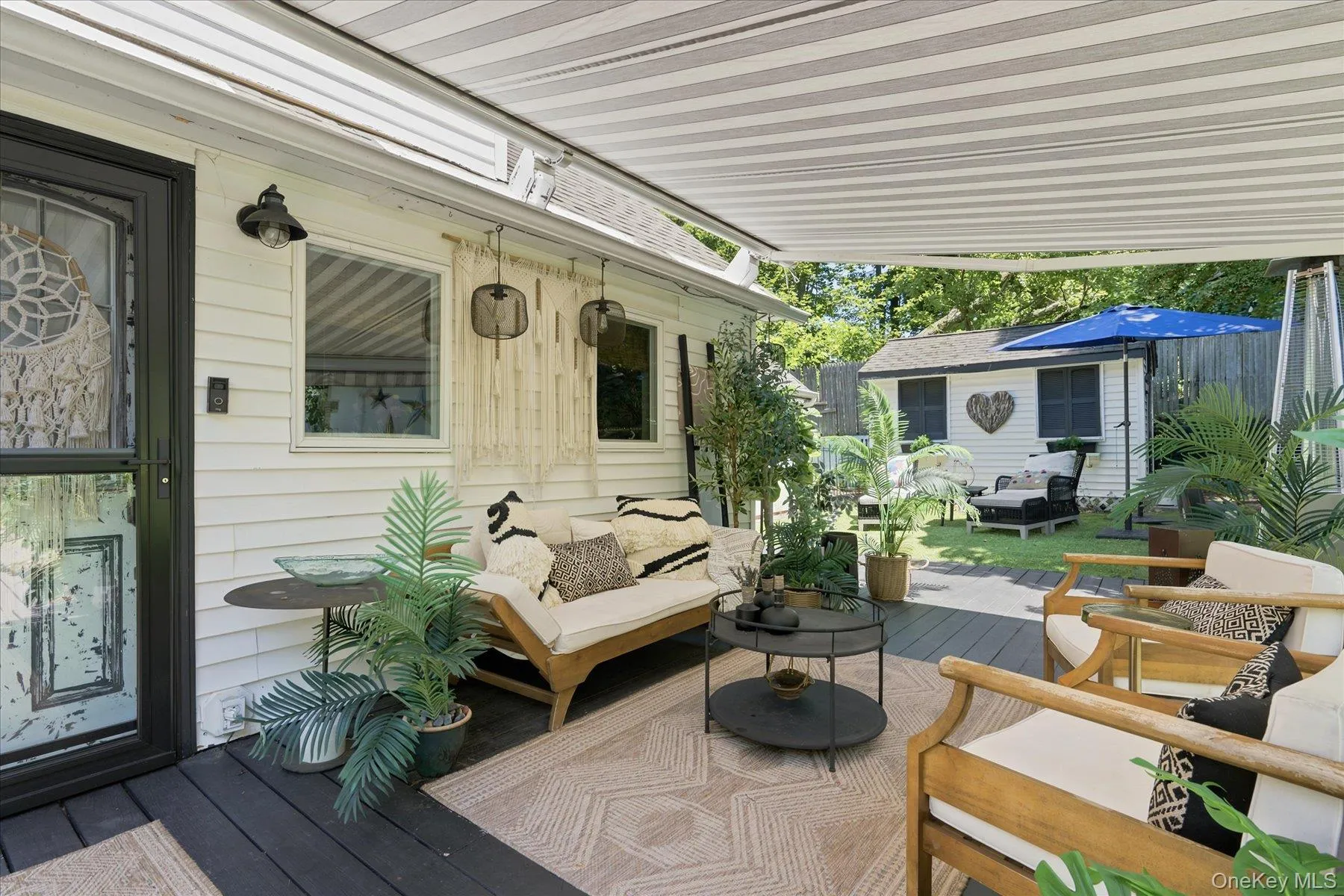 Retractable awning makes your deck like a private courtyard in all seasons and all types of weather Retractable awning makes your deck like a private courtyard in all seasons and all types of weather