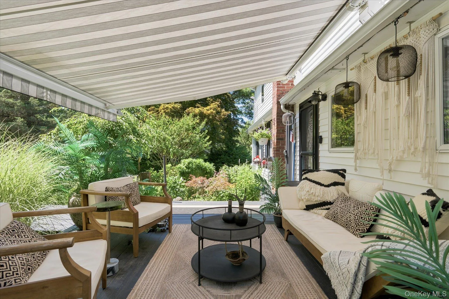 Retractable awning makes your deck like a private courtyard in all seasons and all types of weather Retractable awning makes your deck like a private courtyard in all seasons and all types of weather