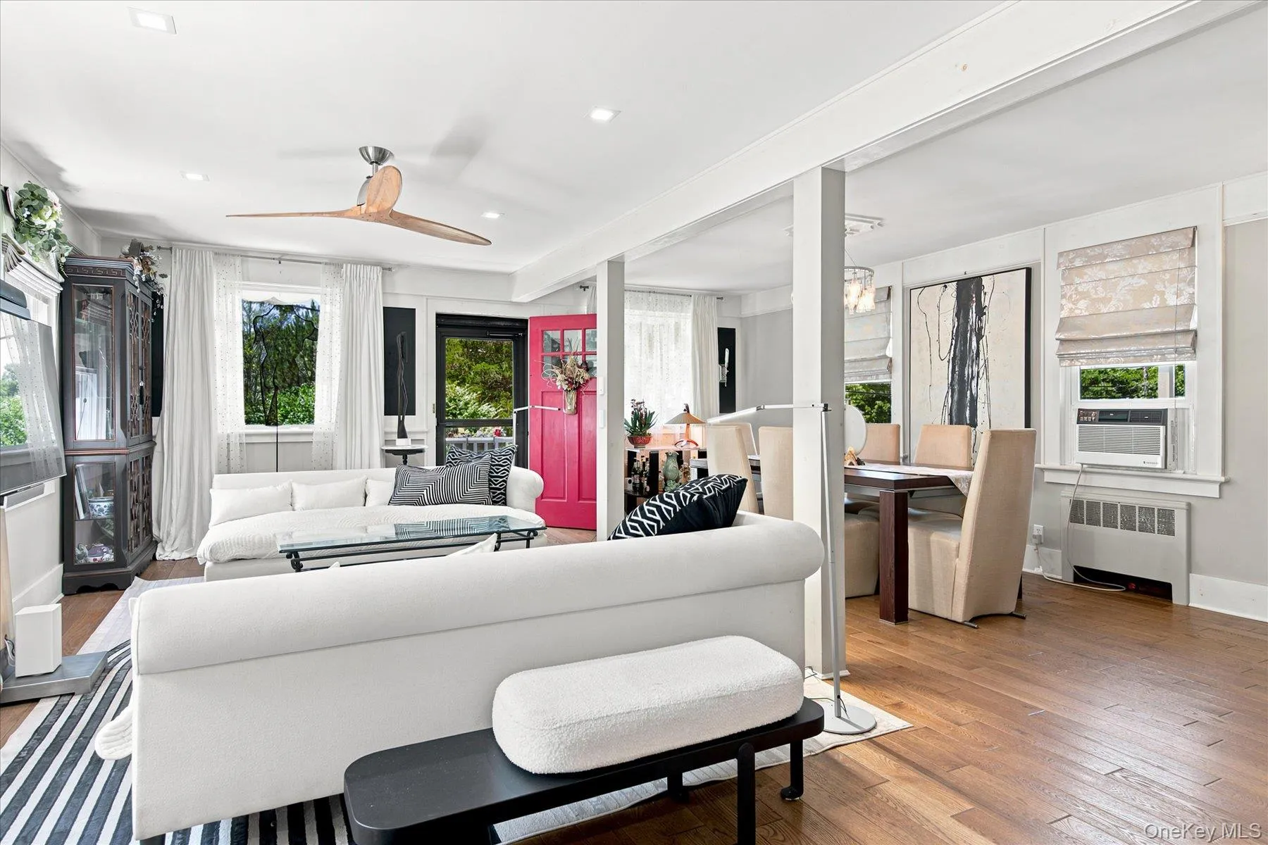 Gleaming hardwood floors and oversized windows fills your great room with plenty of natural light Gleaming hardwood floors and oversized windows fills your great room with plenty of natural light