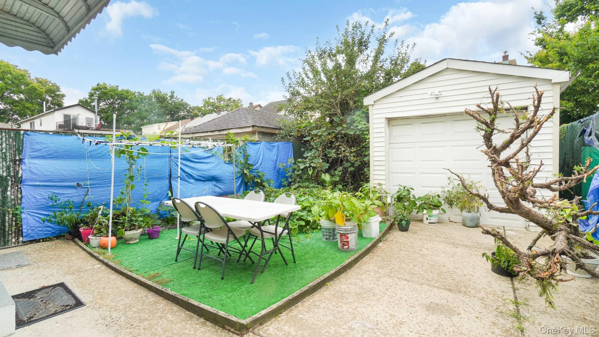 View of patio featuring an outdoor structure View of patio featuring an outdoor structure
