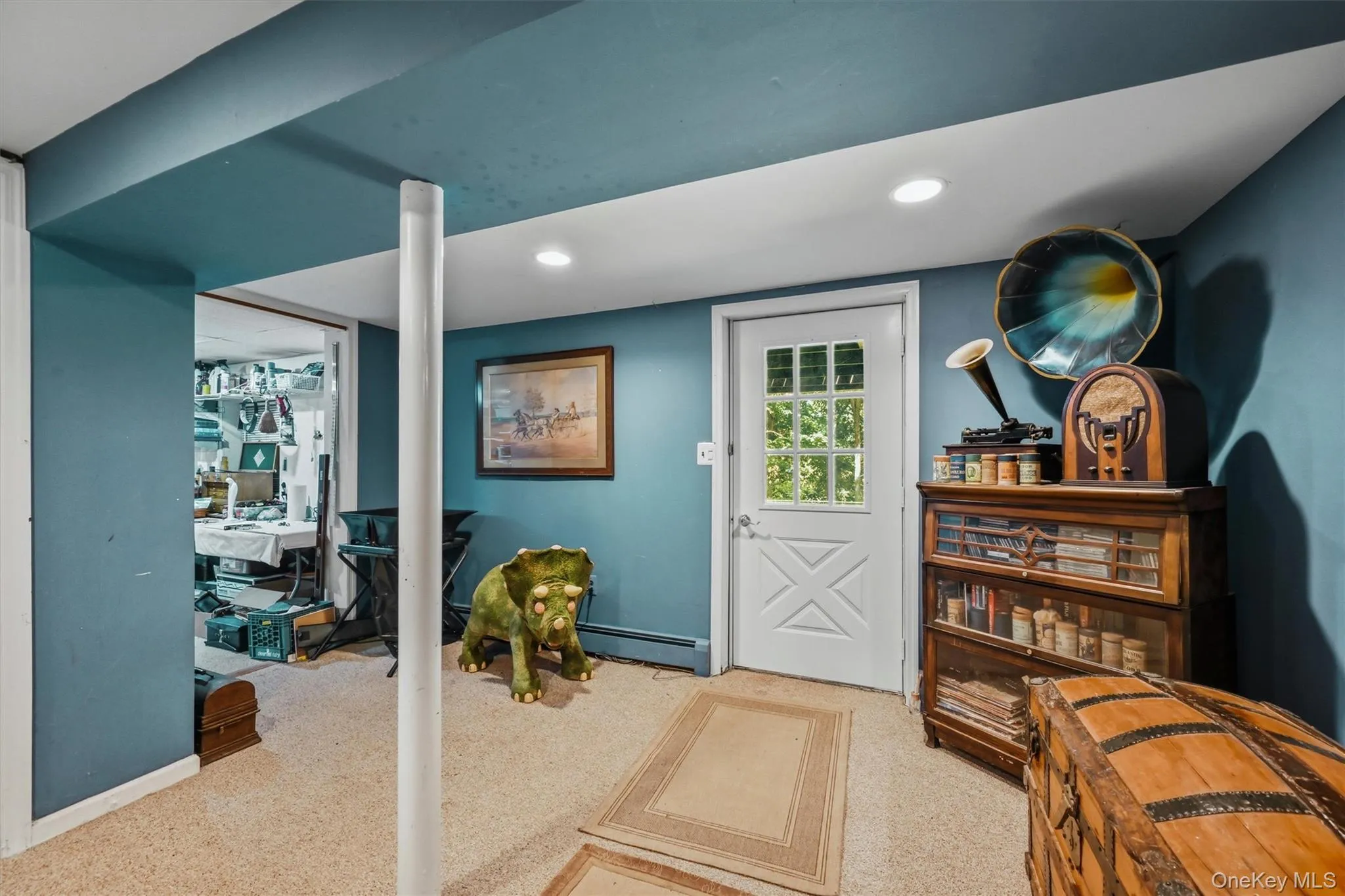 Finished basement providing an open layout with room for a family room, game area, and home gym. Finished basement providing an open layout with room for a family room, game area, and home gym.