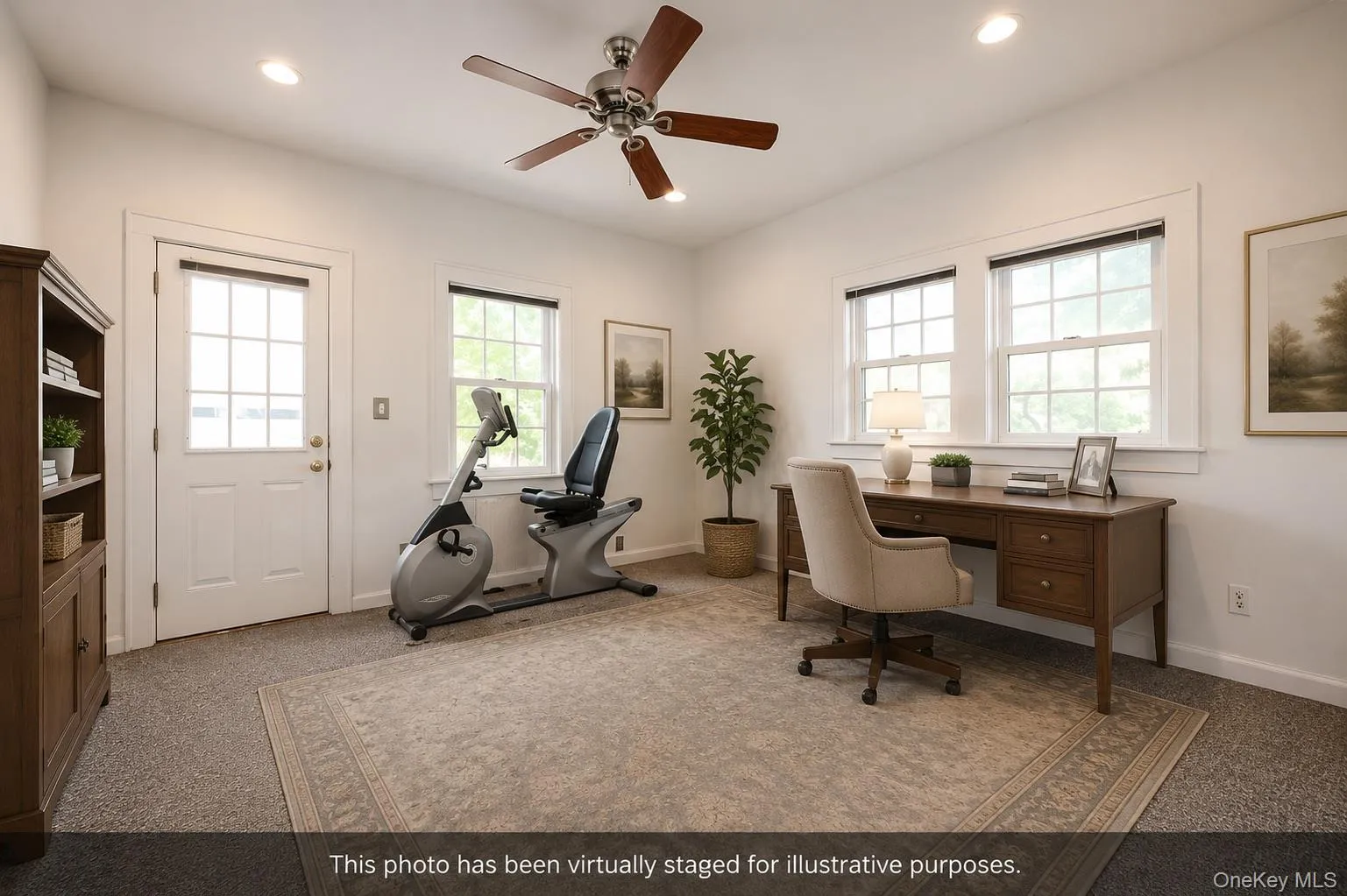 Virtually staged den with entrance to rear deck Virtually staged den with entrance to rear deck