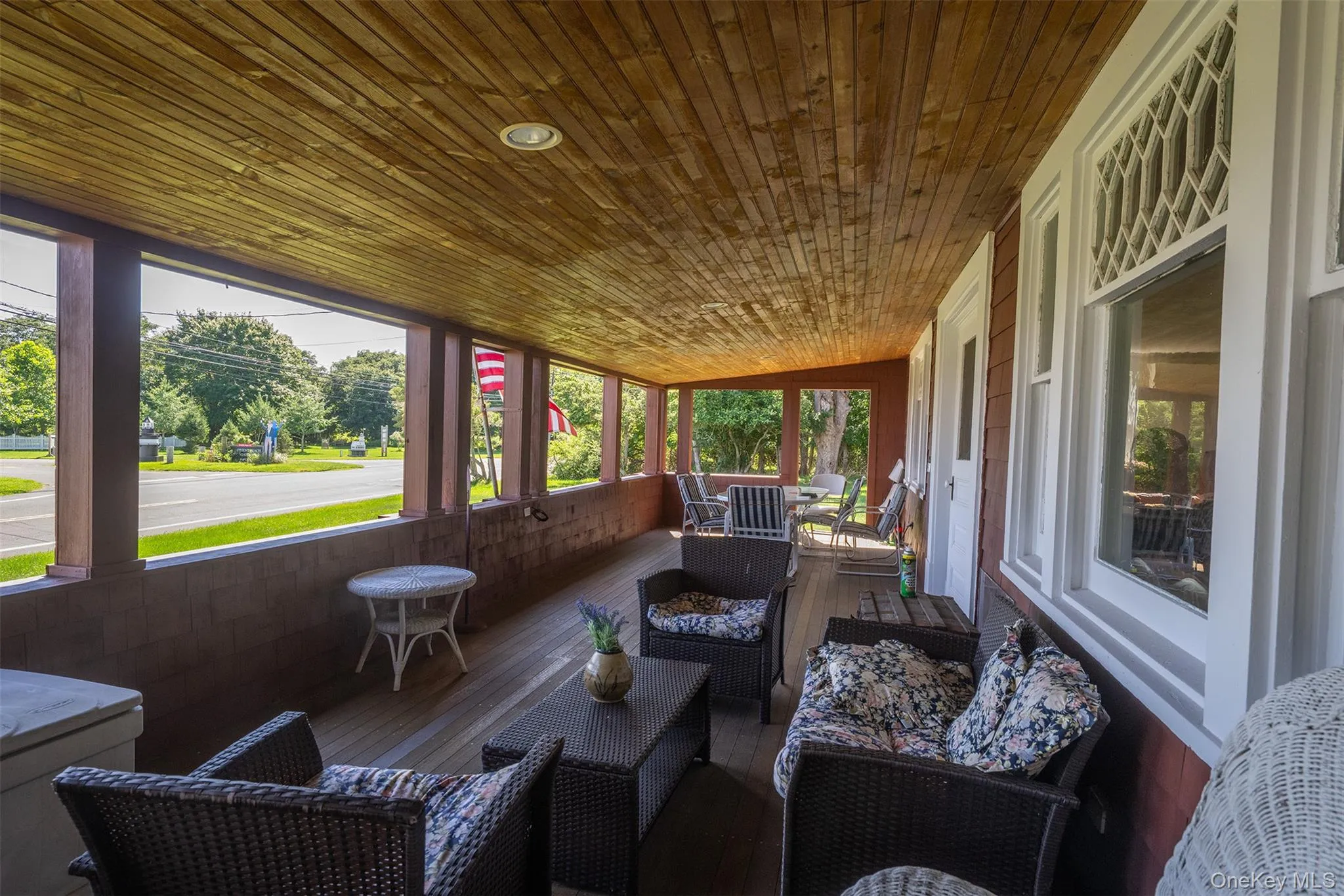 Stunning windows and views from the wide front porch. Stunning windows and views from the wide front porch.