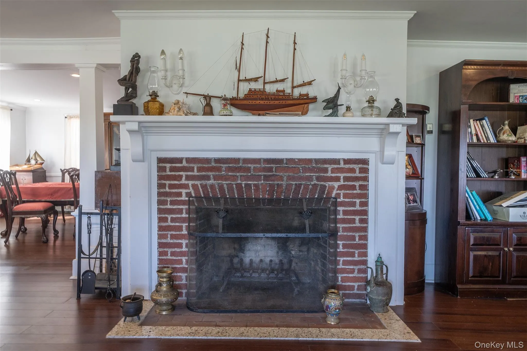 You can see the Craftsmanship with this wood burning fireplace and classic white mantel when you walk in the front door. You can see the Craftsmanship with this wood burning fireplace and classic white mantel when you walk in the front door.
