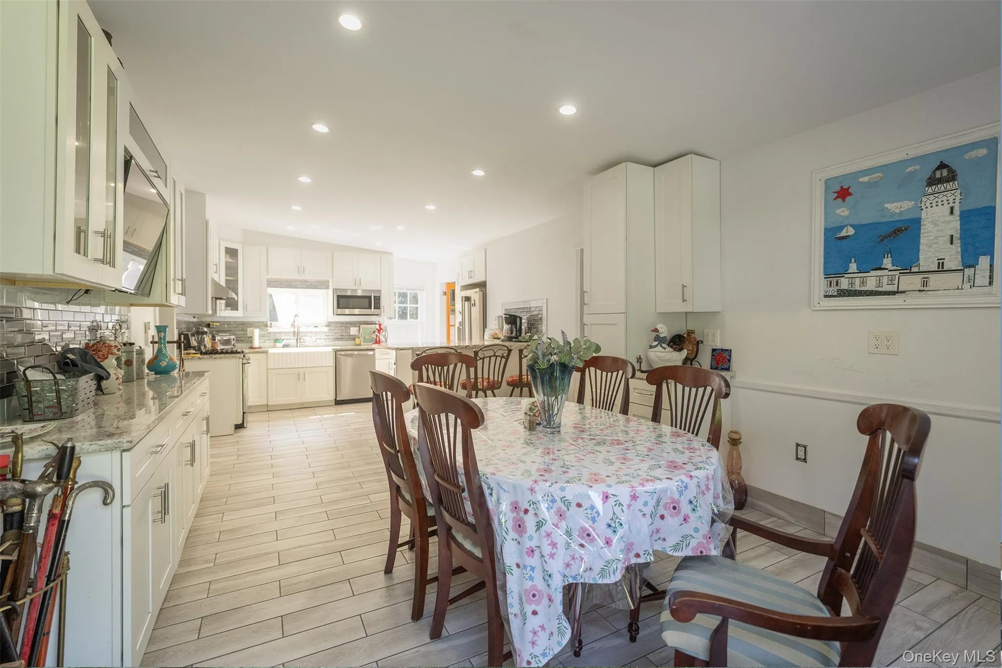 Fully updated with new tile floors, kitchen cabinets with quartz countertops and stainless steel appliances makes this a kitchen you want to spend time in. With a laundry room off to the side with a back mudroom and full bathroom, it is a perfect layout when they come back from fishing off of Plum Gut and need to clean up after a day fishing on the coast or the boats. Fully updated with new tile floors, kitchen cabinets with quartz countertops and stainless steel appliances makes this a kitchen you want to spend time in. With a laundry room off to the side with a back mudroom and full bathroom, it is a perfect layout when they come back from fishing off of Plum Gut and need to clean up after a day fishing on the coast or the boats.