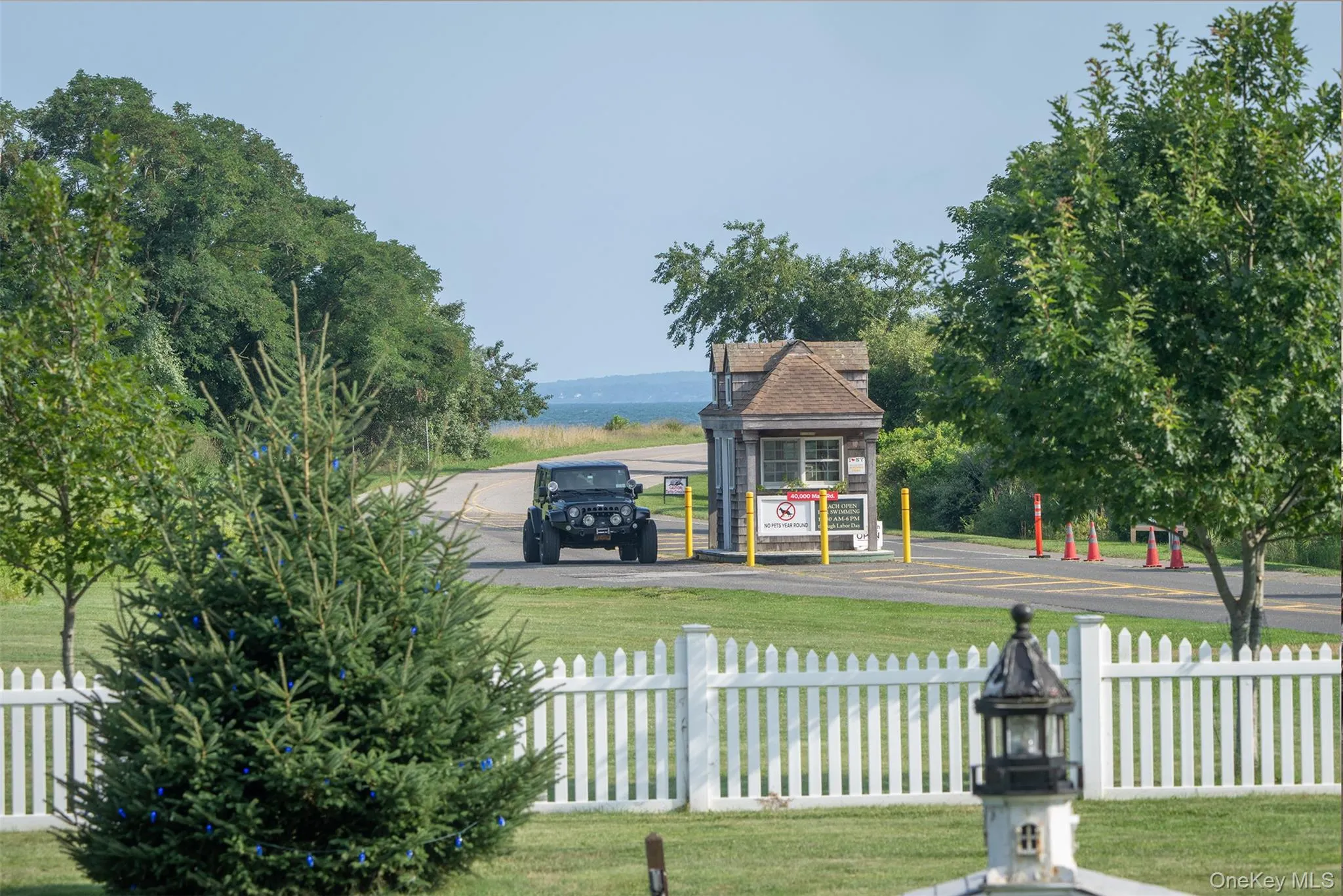 Entrance to Orient Beach State Park with a water view is directly across the street. Entrance to Orient Beach State Park with a water view is directly across the street.
