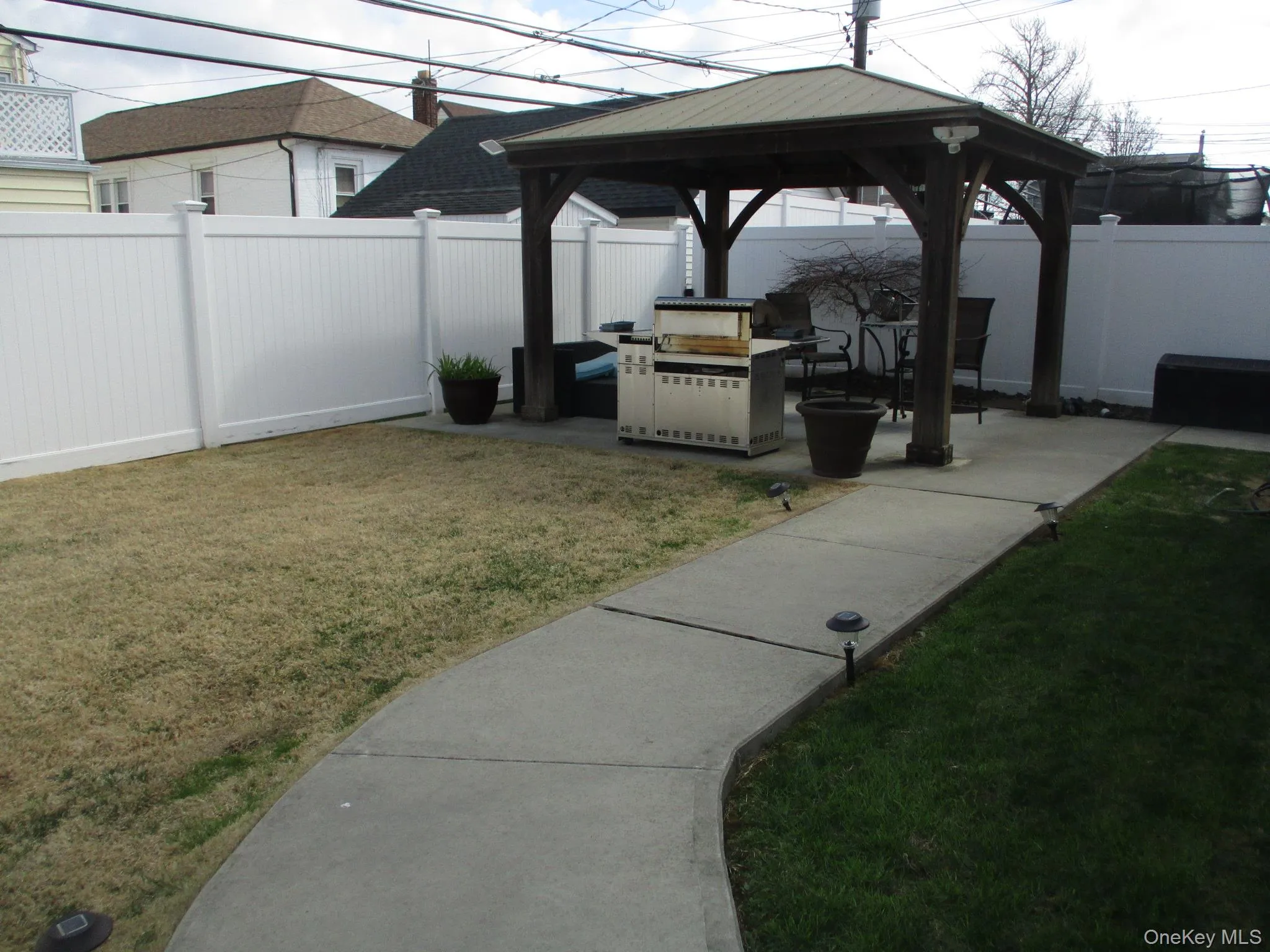 View of yard with a patio, a gazebo, and a fenced backyard View of yard with a patio, a gazebo, and a fenced backyard