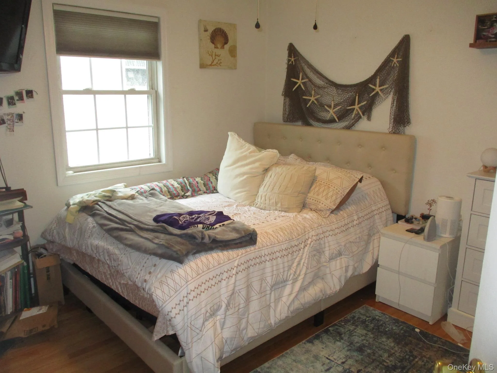 Bedroom with wood finished floors Bedroom with wood finished floors