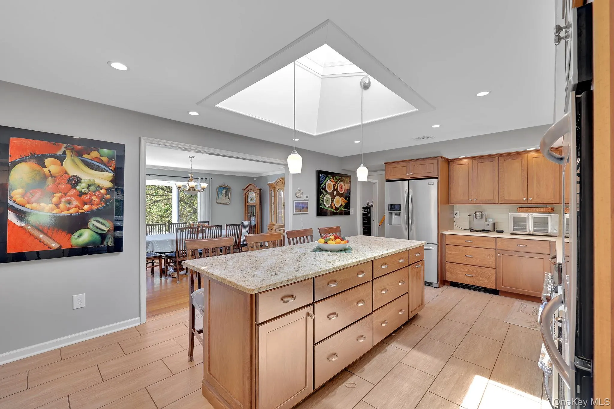 Designed for those who love to cook, this kitchen features a double wall oven along with an additional oven in the range providing ample cooking capacity. Designed for those who love to cook, this kitchen features a double wall oven along with an additional oven in the range providing ample cooking capacity.