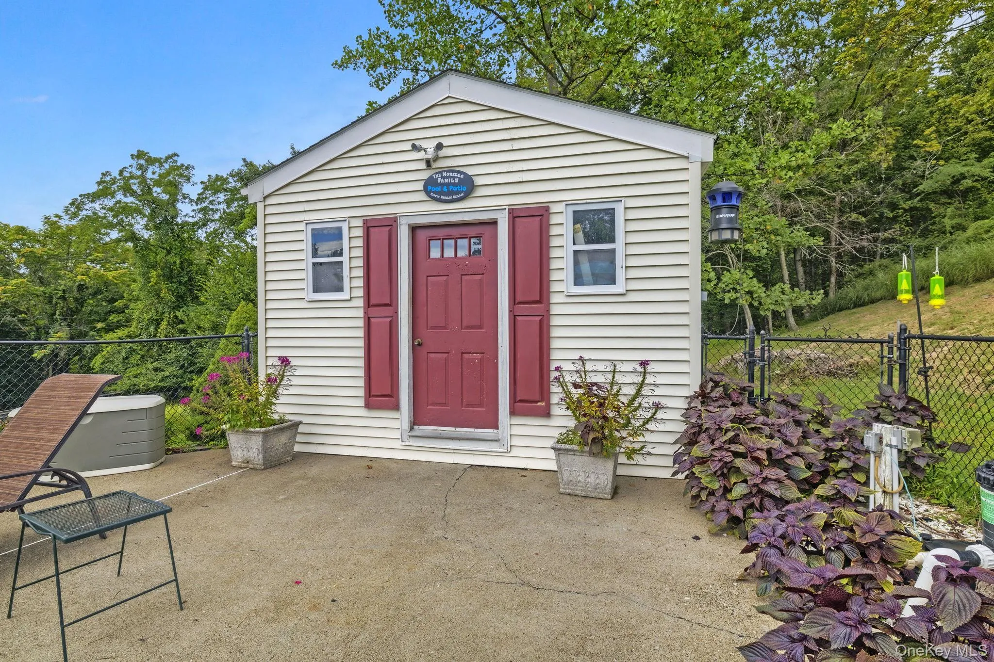 The shed is located off the fenced pool, has electric and electric for the operation of the pool. A great place for storage of all the outside table and chairs etc. The shed is located off the fenced pool, has electric and electric for the operation of the pool. A great place for storage of all the outside table and chairs etc.