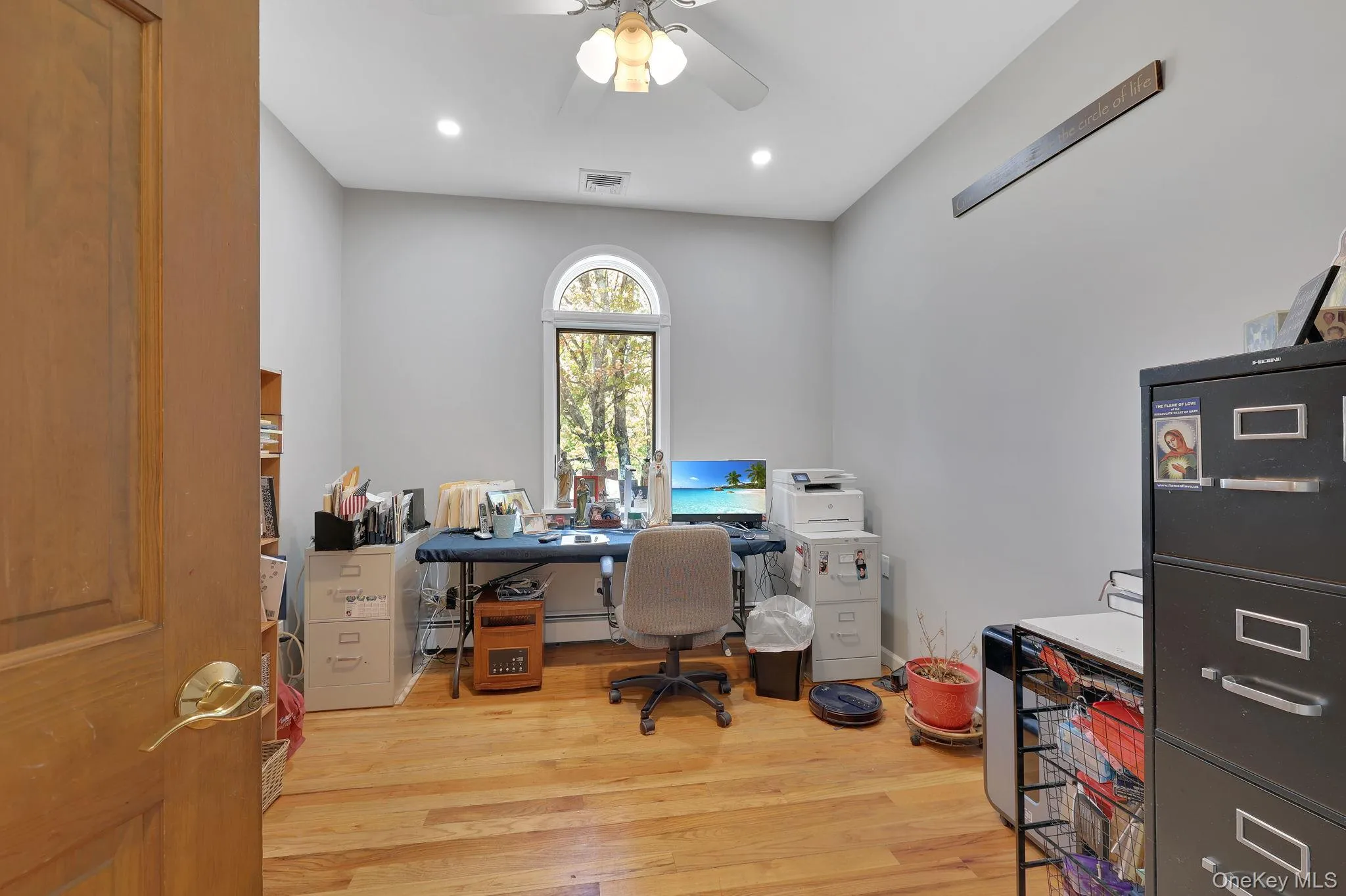 Situated just off the primary bedroom suite, this flexible space is ideal as a home office or, with its closet can easily function as a fifth bedroom Situated just off the primary bedroom suite, this flexible space is ideal as a home office or, with its closet can easily function as a fifth bedroom
