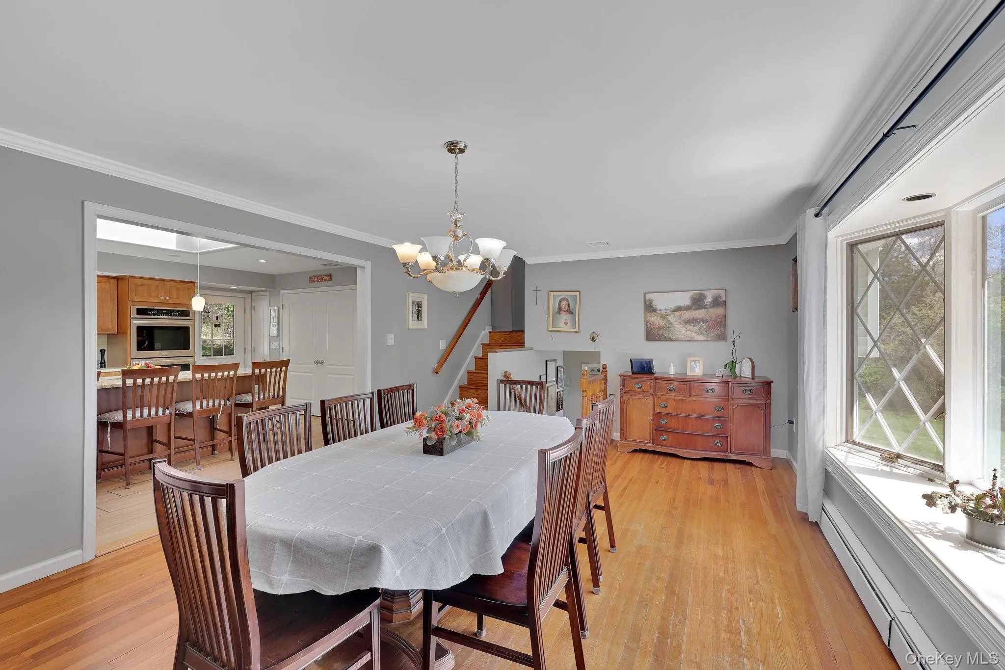 The spacious dining room has hosted countless cherished Christmas Eve celebrations and gathering sixth room to comfortably accommodate 25 to 30 guests for memorable dinners. The spacious dining room has hosted countless cherished Christmas Eve celebrations and gathering sixth room to comfortably accommodate 25 to 30 guests for memorable dinners.