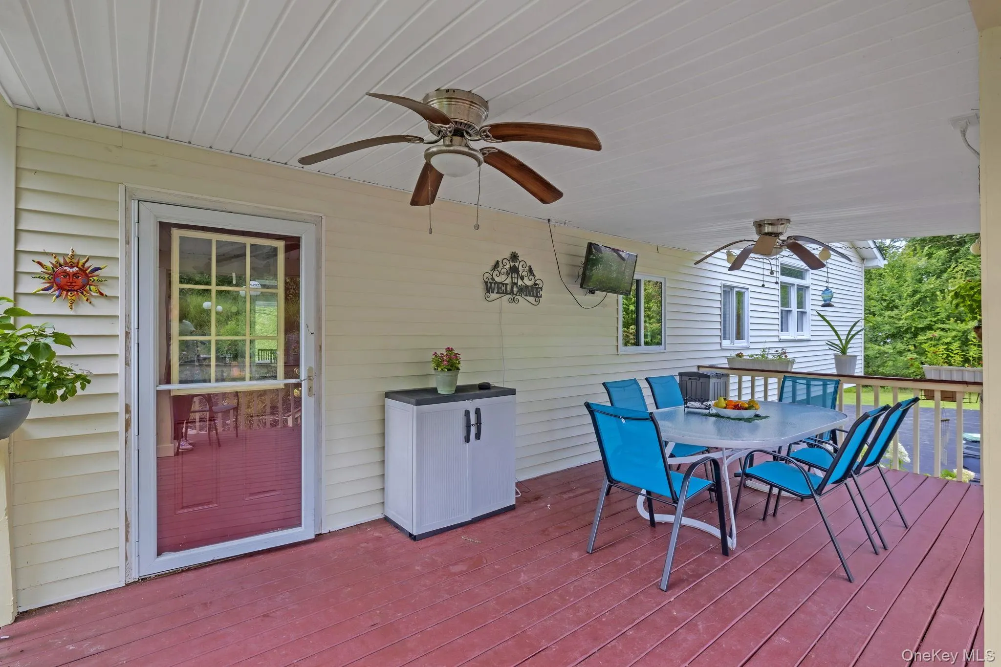 Door only steps away from the kitchen to the deck Door only steps away from the kitchen to the deck