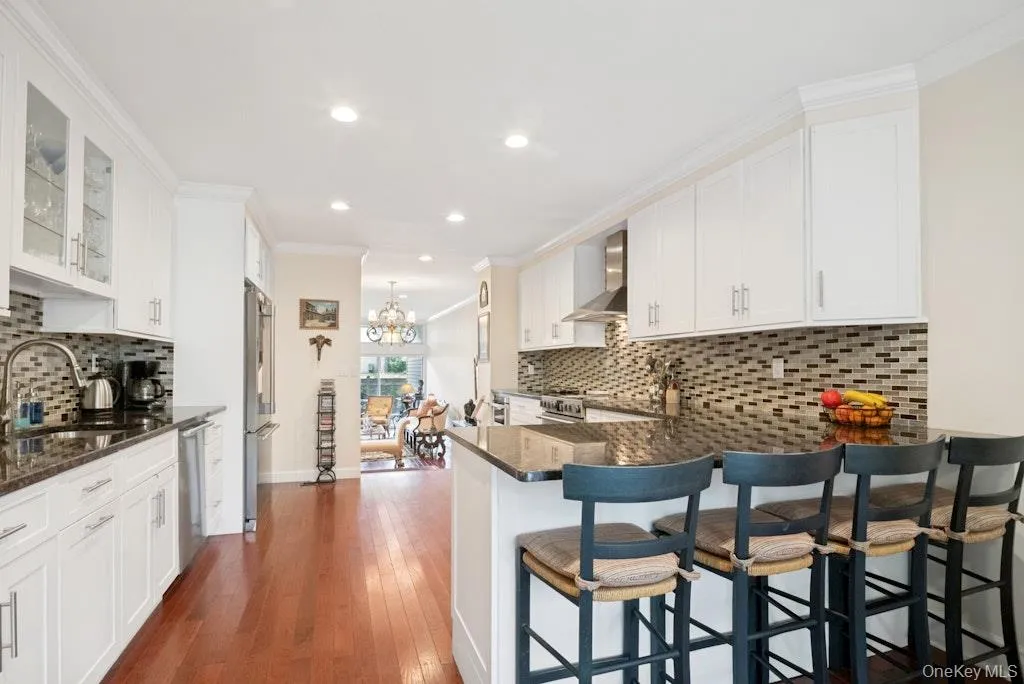Updated Kitchen w/Breakfast Bar open to Living Room Updated Kitchen w/Breakfast Bar open to Living Room