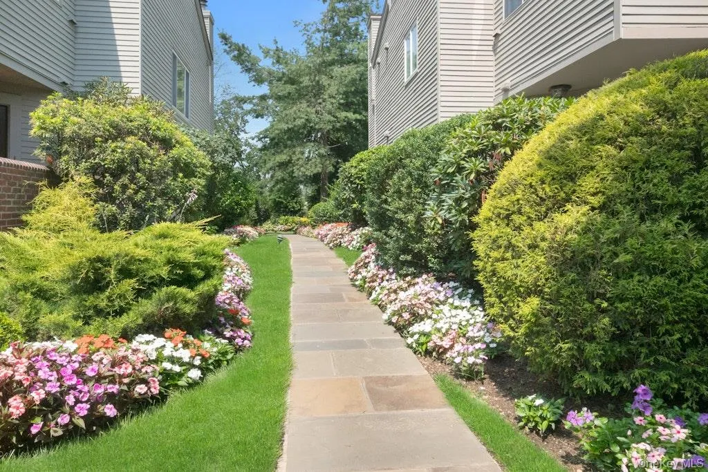 Walkway to the lake and pool - just steps away Walkway to the lake and pool - just steps away