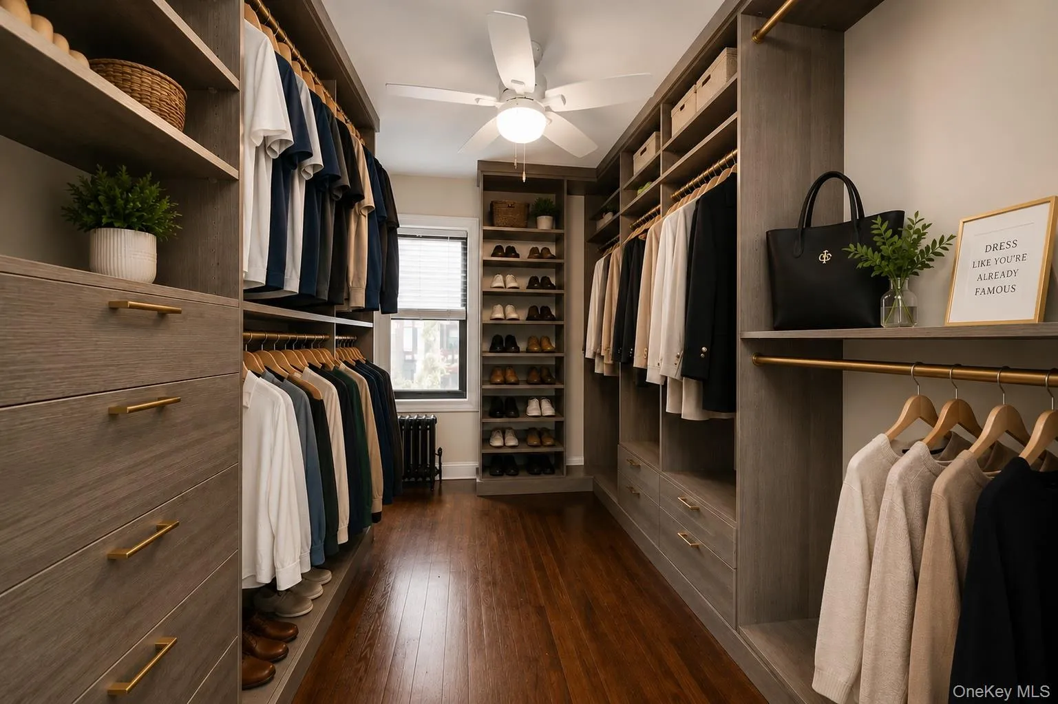This is a bedroom used as a walk-in closet. This is a bedroom used as a walk-in closet.