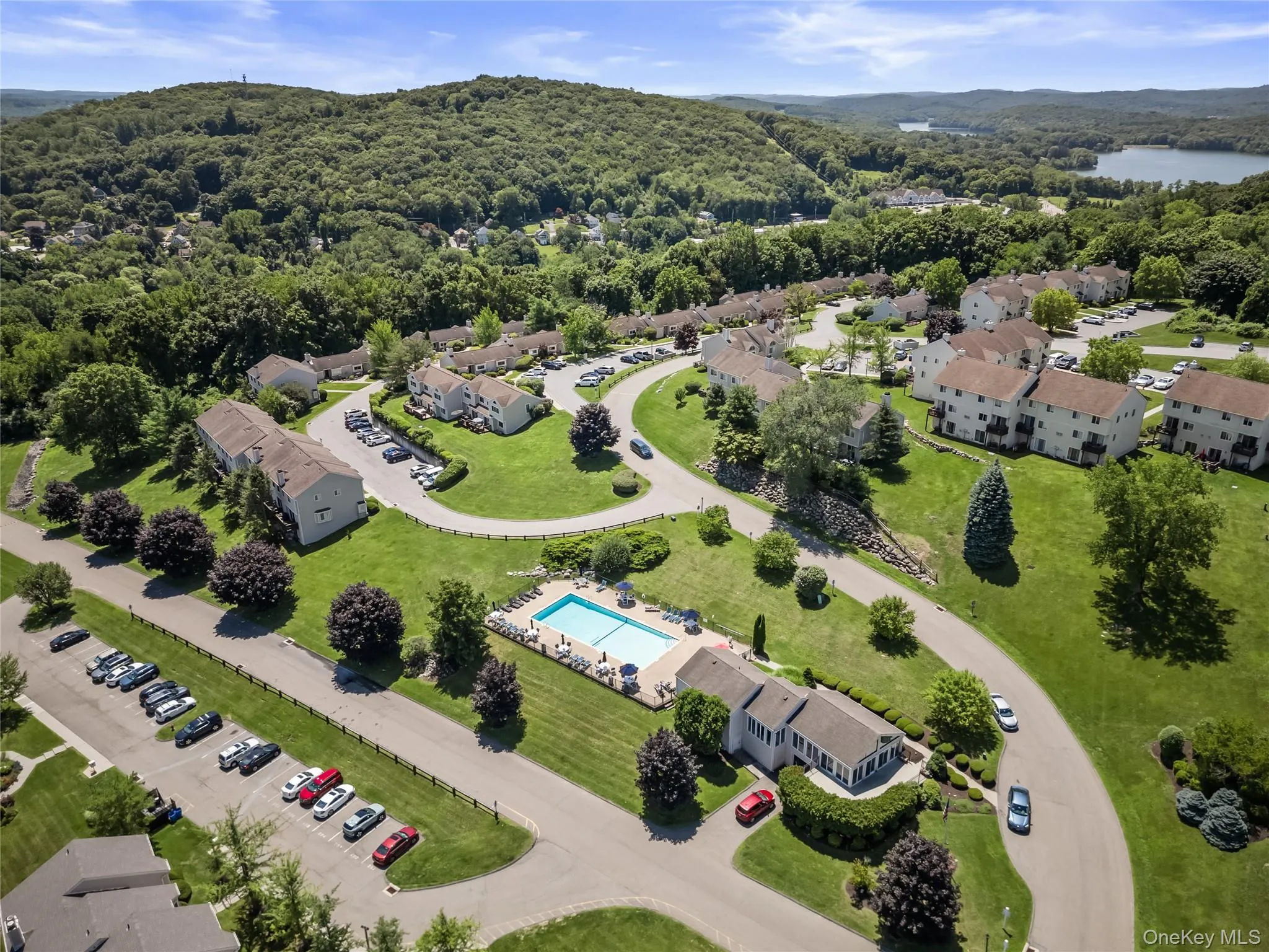 Aerial view of pool and clubhouse. Aerial view of pool and clubhouse.