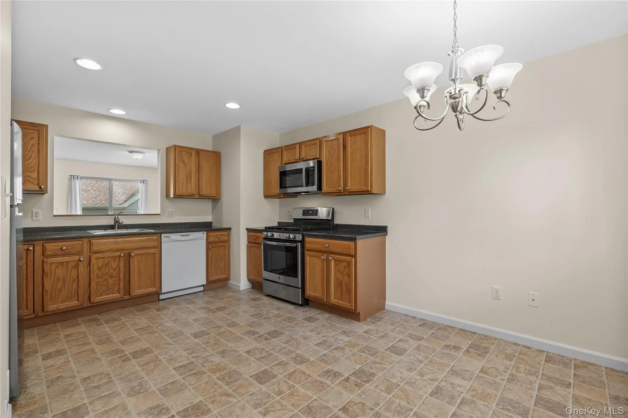 Plenty of room for an island or large table. Plenty of room for an island or large table.