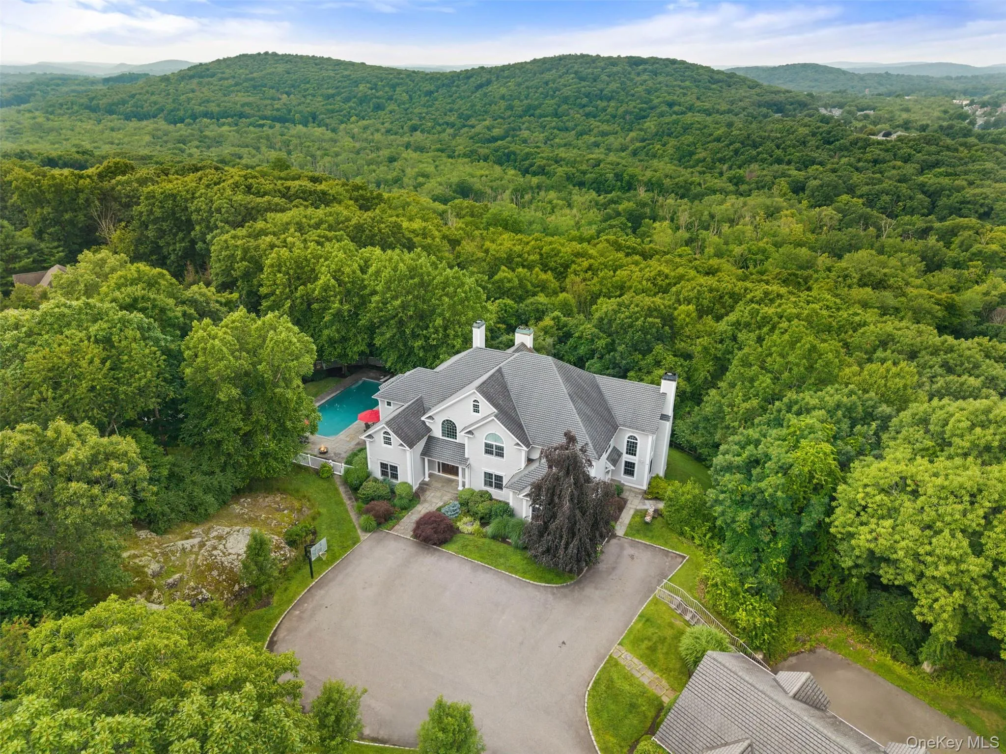 Aerial view of 65 Indian Hill Road. Aerial view of 65 Indian Hill Road.