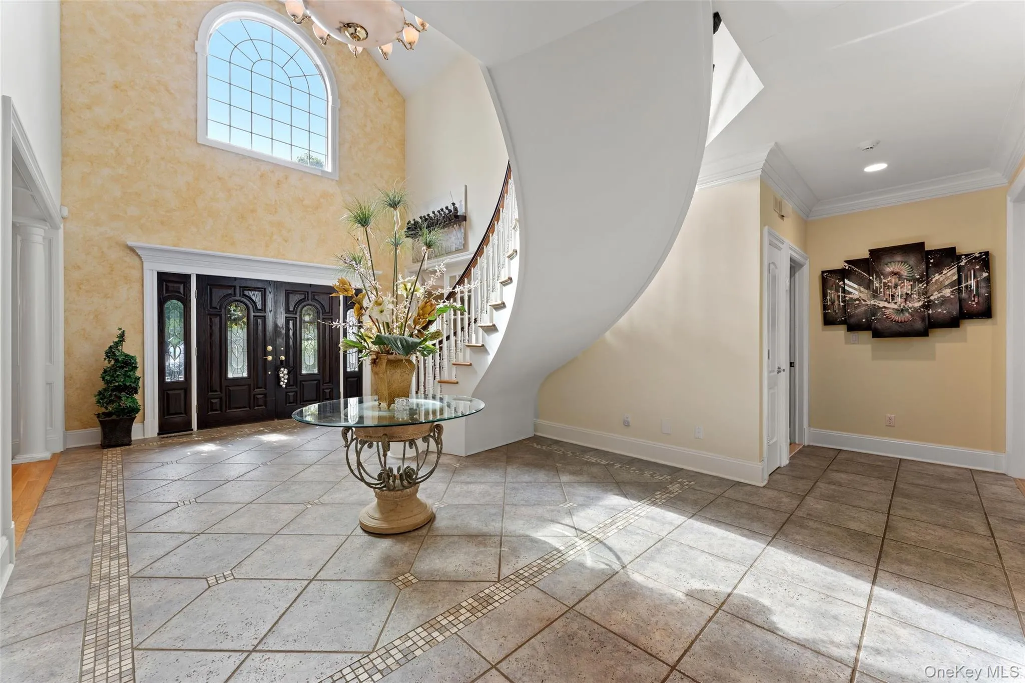 Entrance Hallway views featuring two-story entrance. Entrance Hallway views featuring two-story entrance.